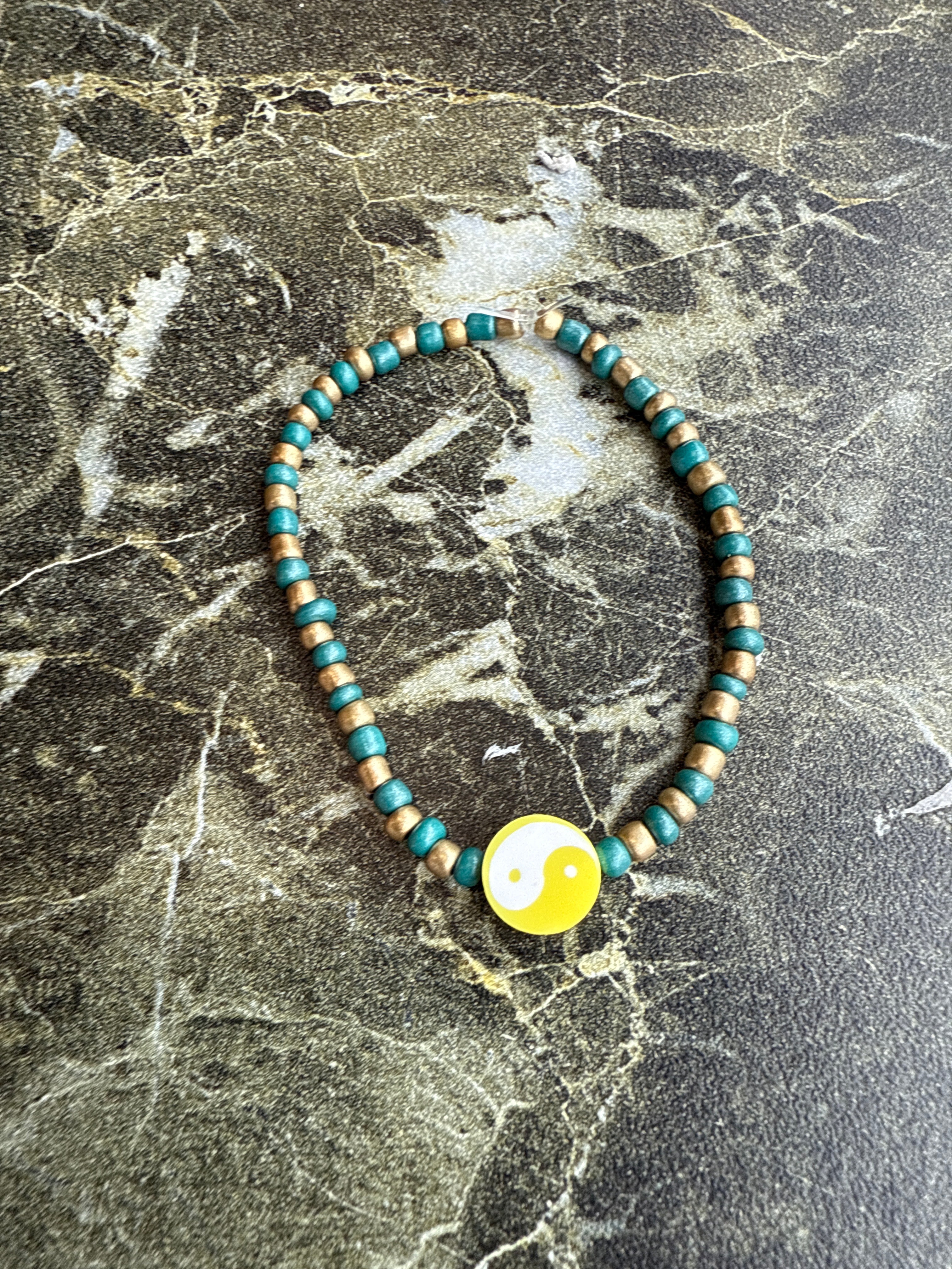 Gold and Green beads ying yang brecelet